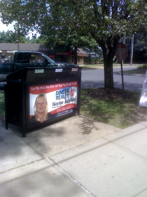 outdoor advertising recycle bin on street